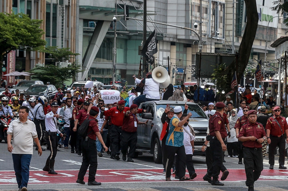People participate in the ‘Himpunan Melayu Berdaulat’ (Sovereign Malay Rally) in front of Sogo Kuala Lumpur May 24, 2025. — Picture by Sayuti Zainudin